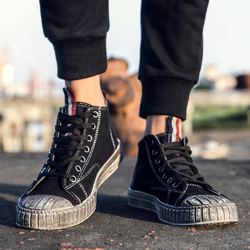 Black distressed casual shoes