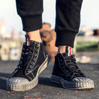 Black distressed casual shoes