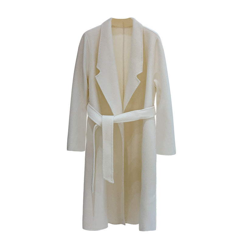A minimalist mid-length woolen coat