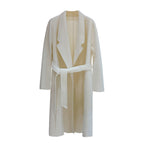 A minimalist mid-length woolen coat