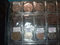 RED COIN BOOK WITH 13 COINS