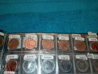 RED COIN BOOK WITH 45 BRITISH 1P COINS