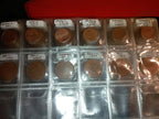 RED COIN BOOK WITH 44 CENT AND EURO COINS