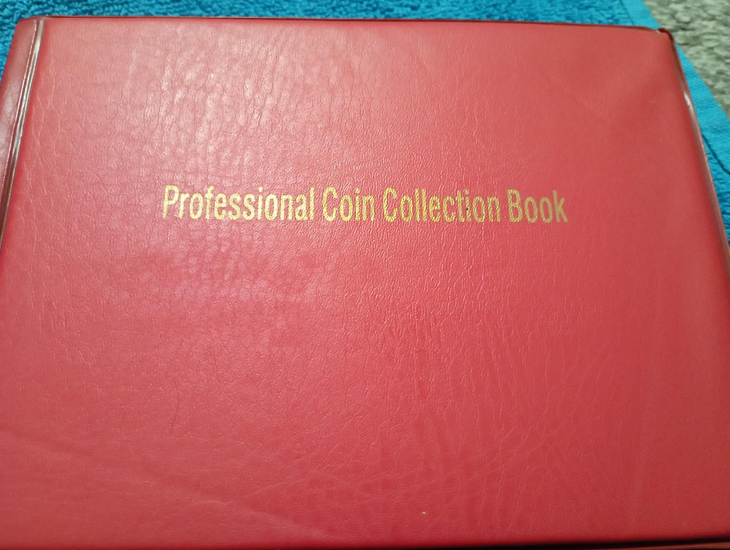 RED COIN BOOK WITH 13 COINS