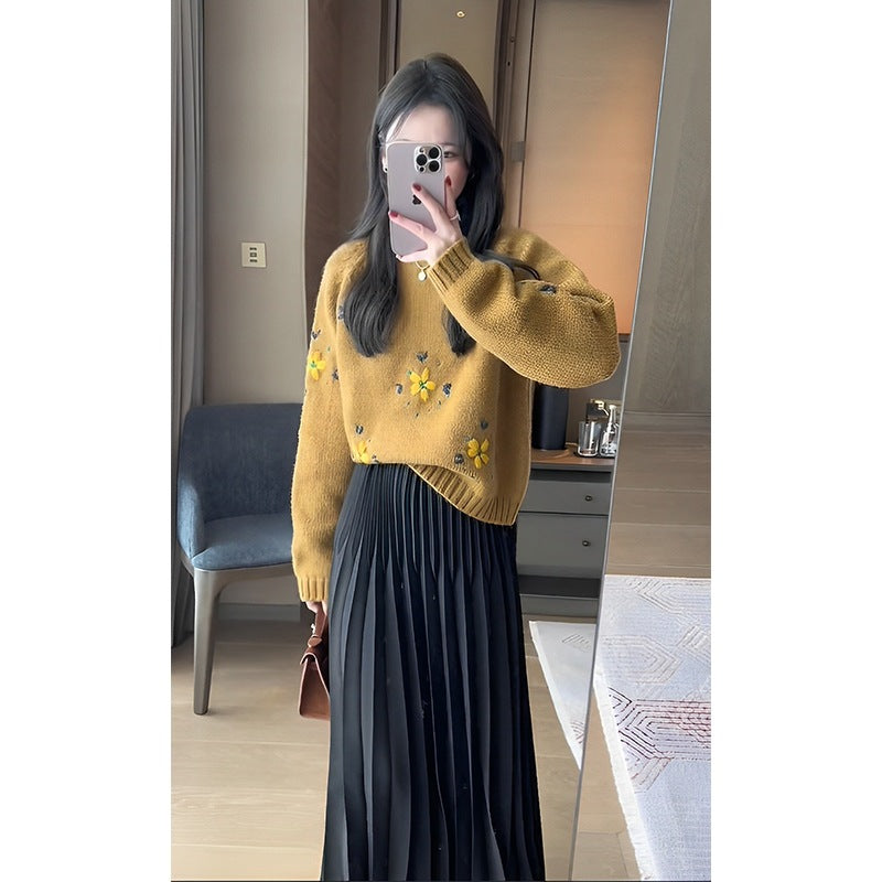 Orange-gelber Vintage Pullover mit Stickerei für Damen im entspannten und lässigen Stil
