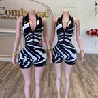 Fashionable Striped Jumpsuit With A Half-zip Front And Collar