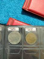 RED COIN BOOK WITH 5 COINS