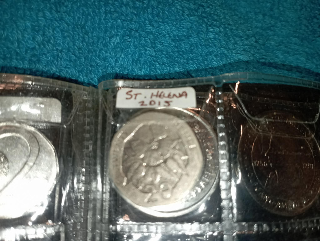 RED COIN BOOK WITH 13 COINS
