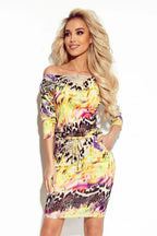 Numoco sporty daydress with 3/4 sleeves and pockets, made of fabric in a colorful leopard pattern