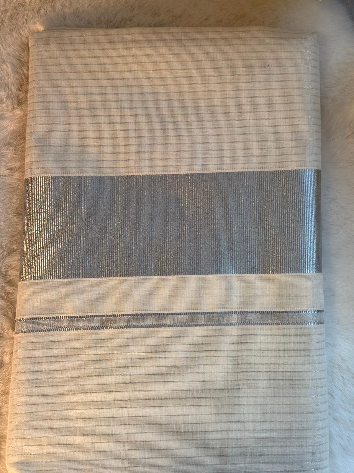 Silver Stripe Kerala Kasavu Saree with Tassel Detailing