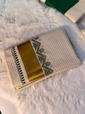 Elegant Kerala Kasavu Saree with Green Ethnic Border