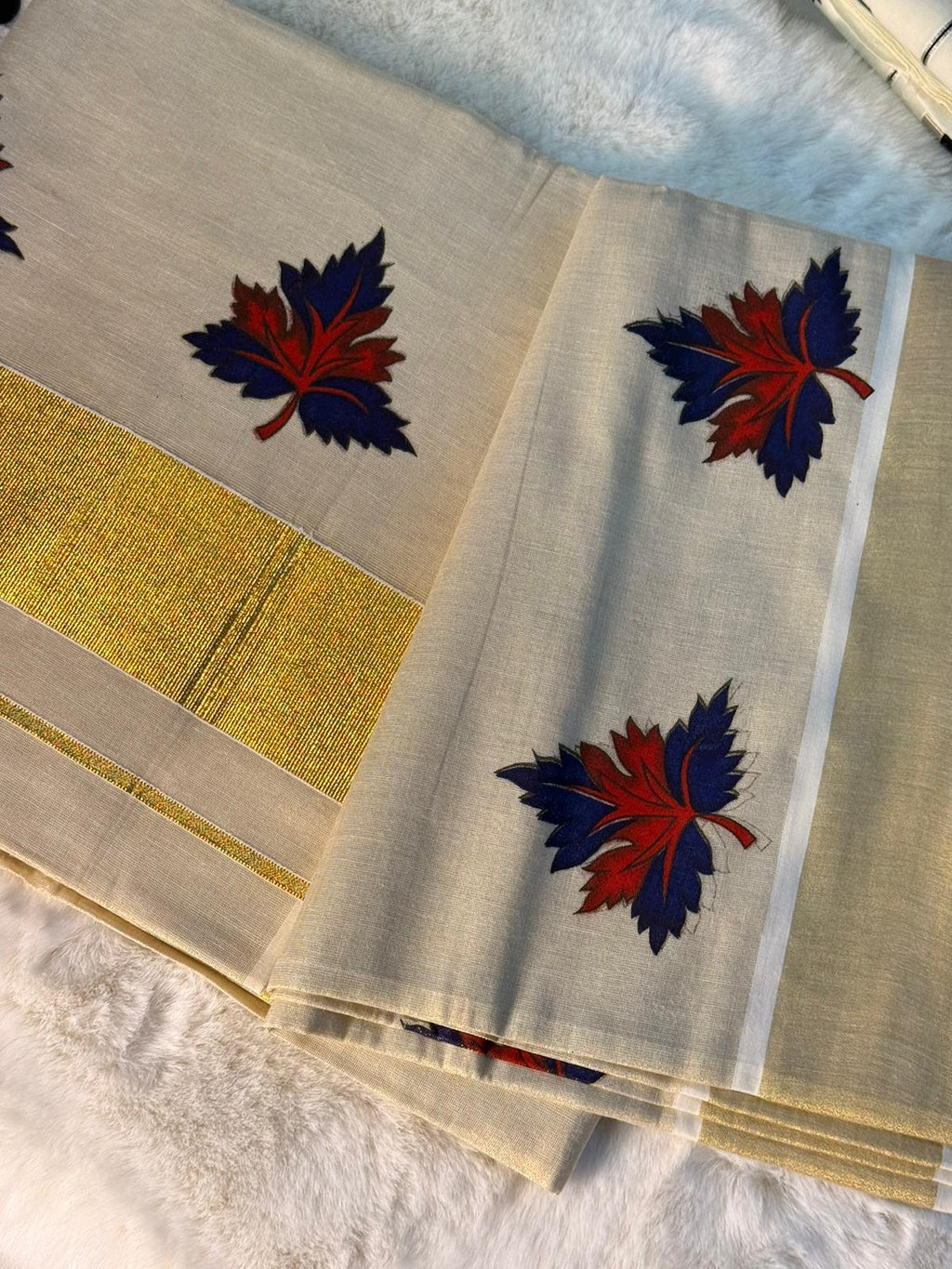 Maple Leaf Inspired Kerala Kasavu Saree with Dual-Tone Print