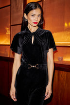 Yumi Black Velvet Jumpsuit With Twist Neckline And Buckle Belt