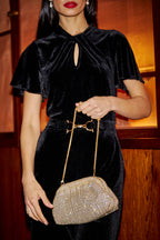 Yumi Black Velvet Jumpsuit With Twist Neckline And Buckle Belt