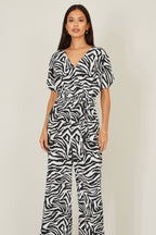 Yumi Black Zebra Print Relaxed Jumpsuit