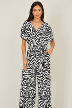 Yumi Black Zebra Print Relaxed Jumpsuit