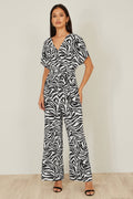 Yumi Black Zebra Print Relaxed Jumpsuit