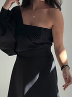 Black Two-Piece Set With Textured Strapless Top And Flared Mini Skirt