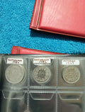 RED COIN BOOK WITH 5 COINS