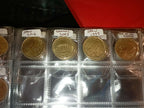 RED COIN BOOK WITH 44 CENT AND EURO COINS