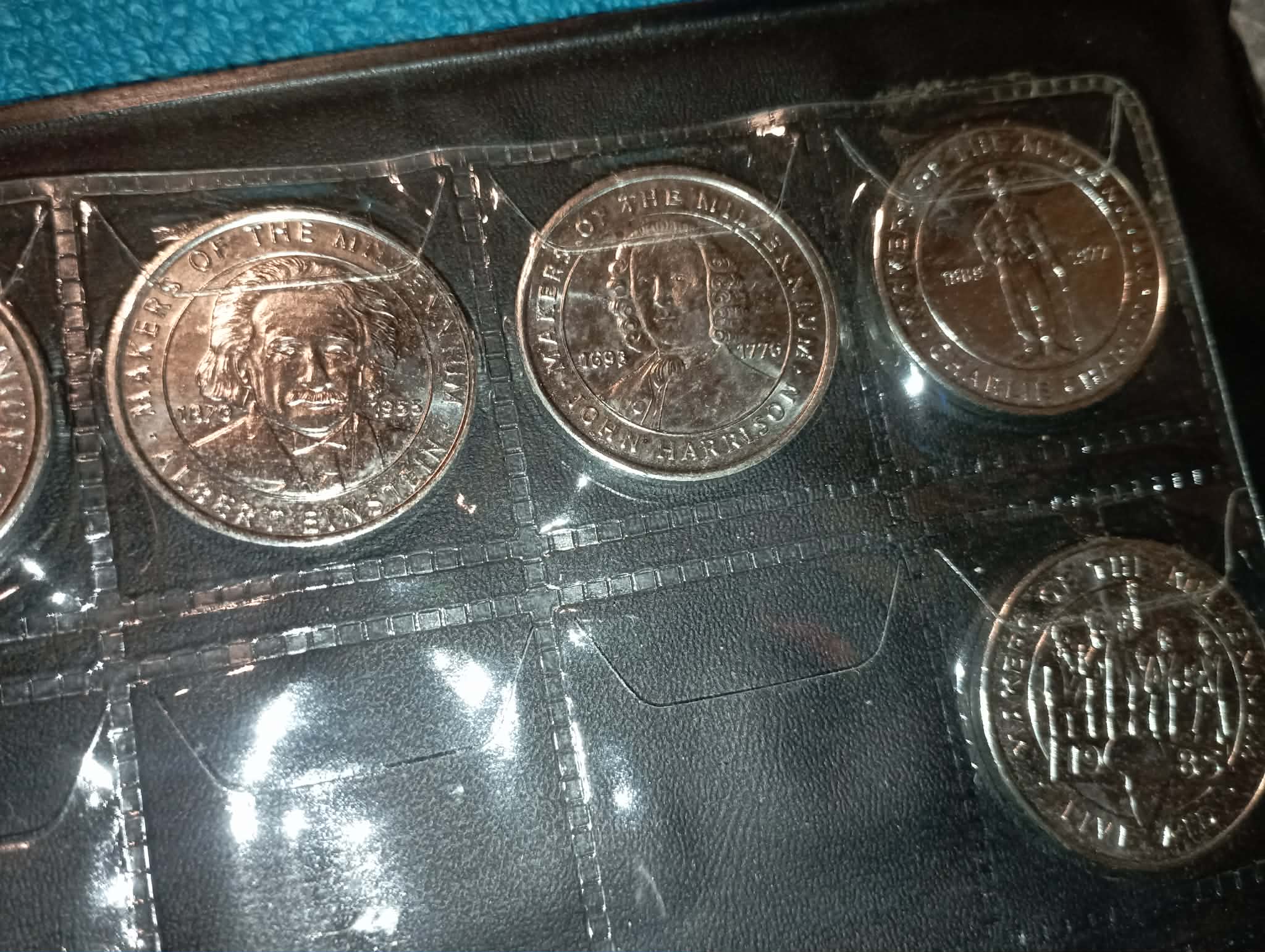 RED COIN BOOK WITH 13 COINS