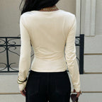 French-style Niche Off-white Top For Women Irregularly Crossed Pleated Design On The Front Chest Long Sleeves Loose Fit And Figure-flattering