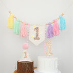 JUIIZAY Baby First Birthday Decorations — Macaron High Chair Banner, Daisy Crown & Cake Topper