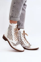 Step in style Unique openwork women's boots.
