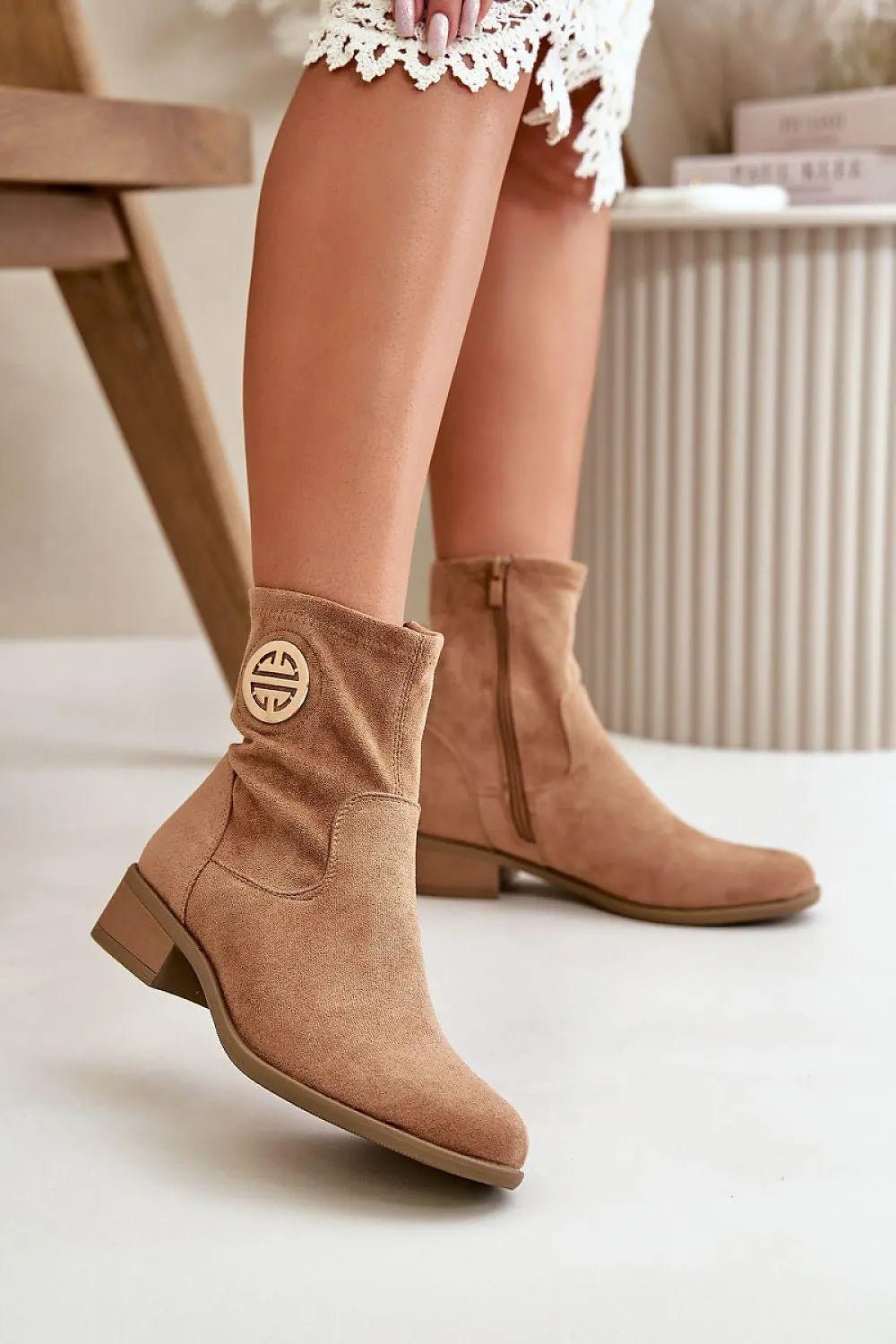 Step in style Women's ankle boots with a low heel from the Jezzi brand