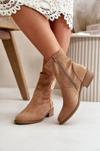 Step in style Women's ankle boots with a low heel from the Jezzi brand