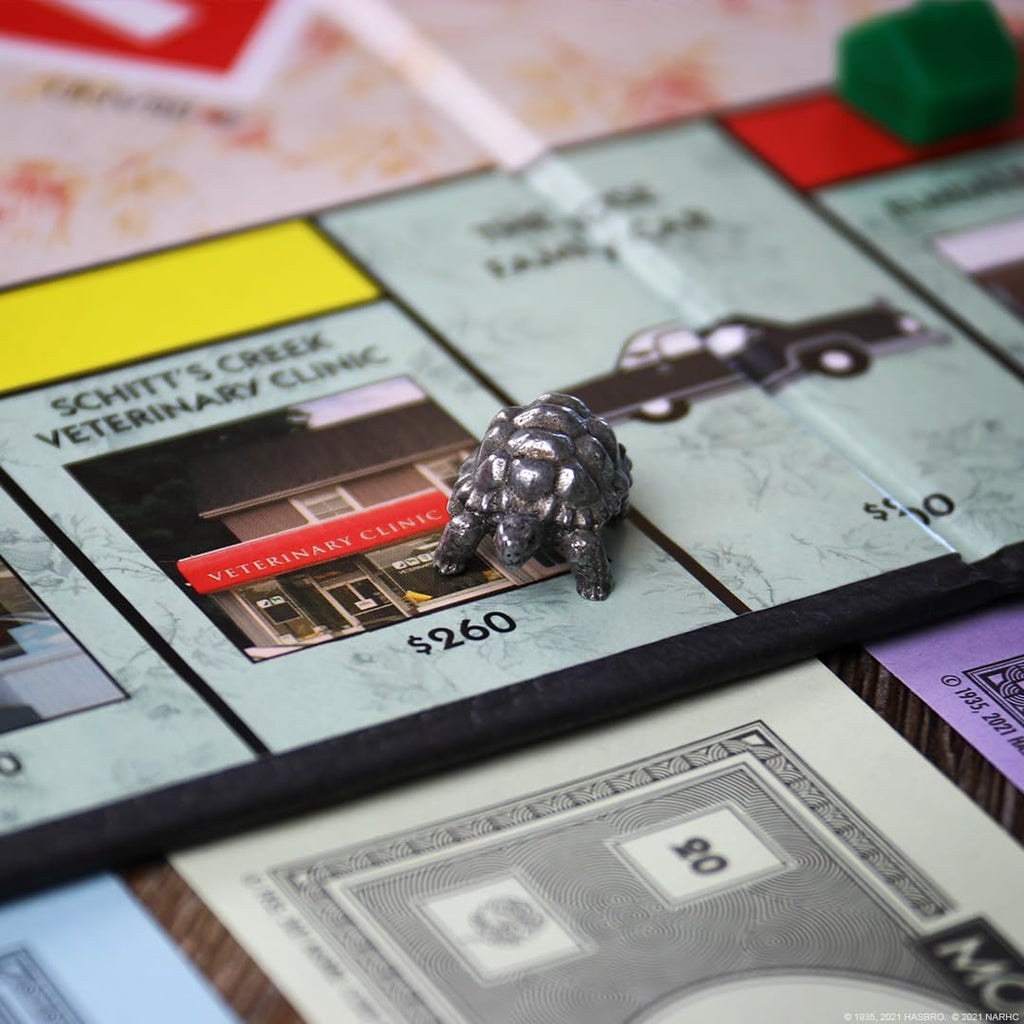 USAOPOLY Monopoly Schitt's Creek – Officially Licensed Collectible Edition with 6 Tokens