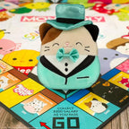 Winning Moves Monopoly Squishmallows Collector’s Edition with Cam Cat Plush – 2–6 Players