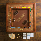 Monopoly Luxury Edition by WS Game Company — Burl Wood Cabinet, Gold Foil Stamped Game Board, Faux Leather Rolling Area, and 2 Storage Drawers